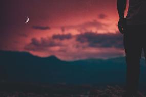 man Silhouette and purple sunset sky