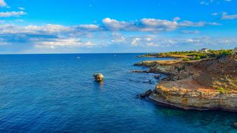 rocky coast near the sea in cyprus in summer