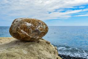 big stone on cliff at Sea