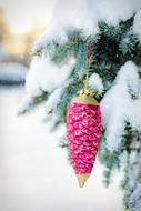 pink pine cone as a christmas decoration