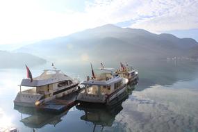 Boats at Lake Water at sunlight