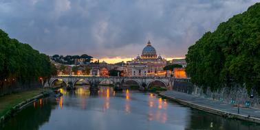 view of the Pont de Sant'Angelo at dusk