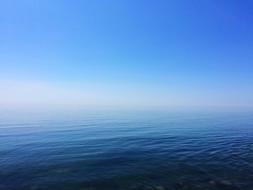 Ocean Water merges with the blue sky