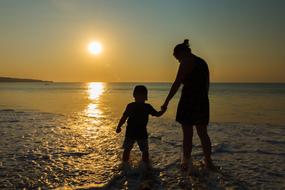 couple family at Sunset Sea Beach