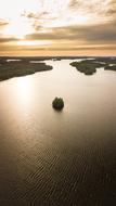 aerial photography of the lake at cloudy twilight