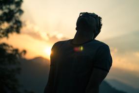 Man Thinking at Sunset