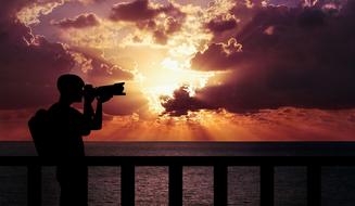 Photographer at Sunset Evening