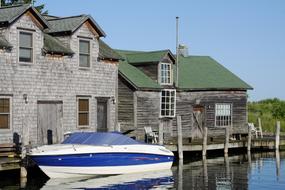 the boat is parked near the shore