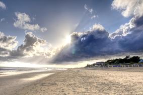 Sun Clouds over Beach