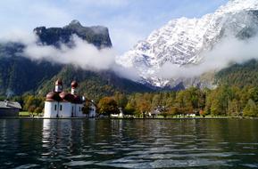 church on the shore of a mountain lake