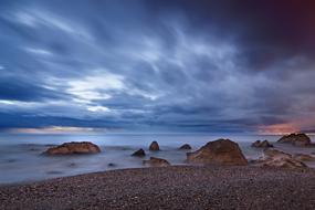 pebble beach against the backdrop of a cloudy sky