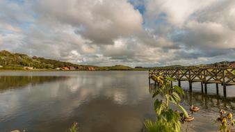 clouds over a lake in denmark