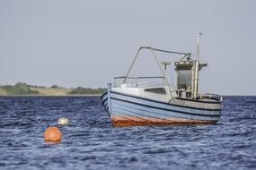 boat at sea on a sunny day