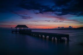 twilight over the pier at sea