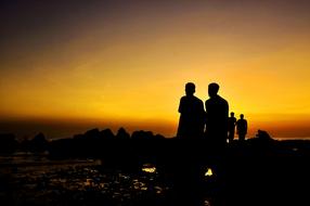 men on beach at Golden Sunset, saudi arabia, jeddah corniche