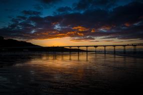 Beautiful pier of Saltburn, Yorkshire, England, at colorful and beautiful sunset in clouds, in the autumn
