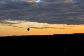 Landscape of hot air ballooning at sunset sky