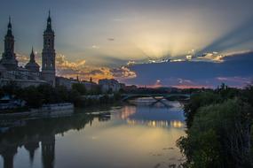 beautiful old city on riverside at sunrise, spain, zaragoza