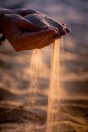 Sand in Fingers Time