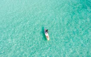 african american kayak on turquoise water