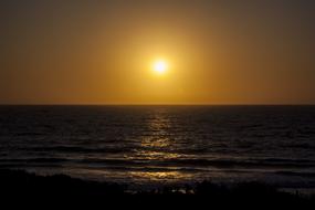 setting sun over the sea in australia