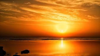 bright sun on the sea horizon during sunset