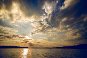clouds over a lake in poland