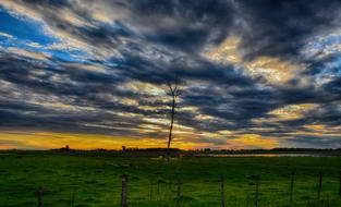 cloudy sunset over rural landscapes