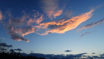 white clouds in the sky during sunset