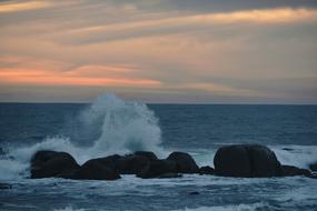 rocks on sea at Sunset