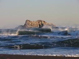 The Pacific Ocean Rocks Wave