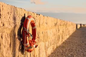 Lifebelt on Stone Wall