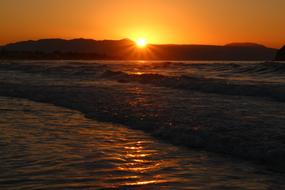 golden evening sun, sea, waves