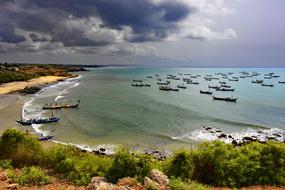 fishing boats on the coast in senya beraku, ghana, west africa