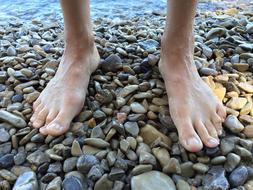 Feet Barefoot on Beach