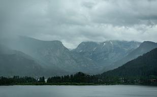landscape of Foggy Lake and mountain