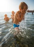 kids playing in Ocean Water