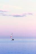 Sailboat in Water at Dusk