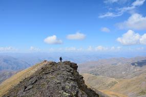 man on the top of the Caucasus Mountain