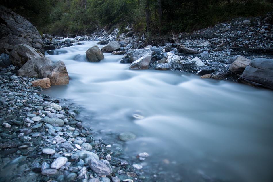 stream among rocks with stones