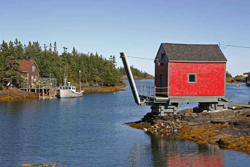wooden house on the coast in canada