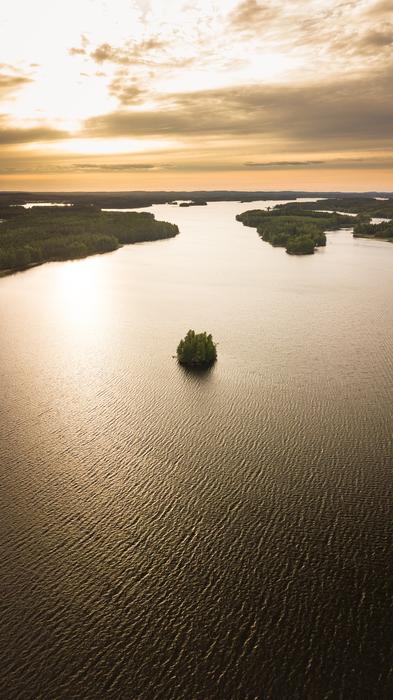 aerial photography of the lake at cloudy twilight
