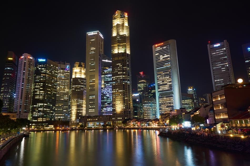 Coast of Singapore, with buildings and colorful lights, at the night