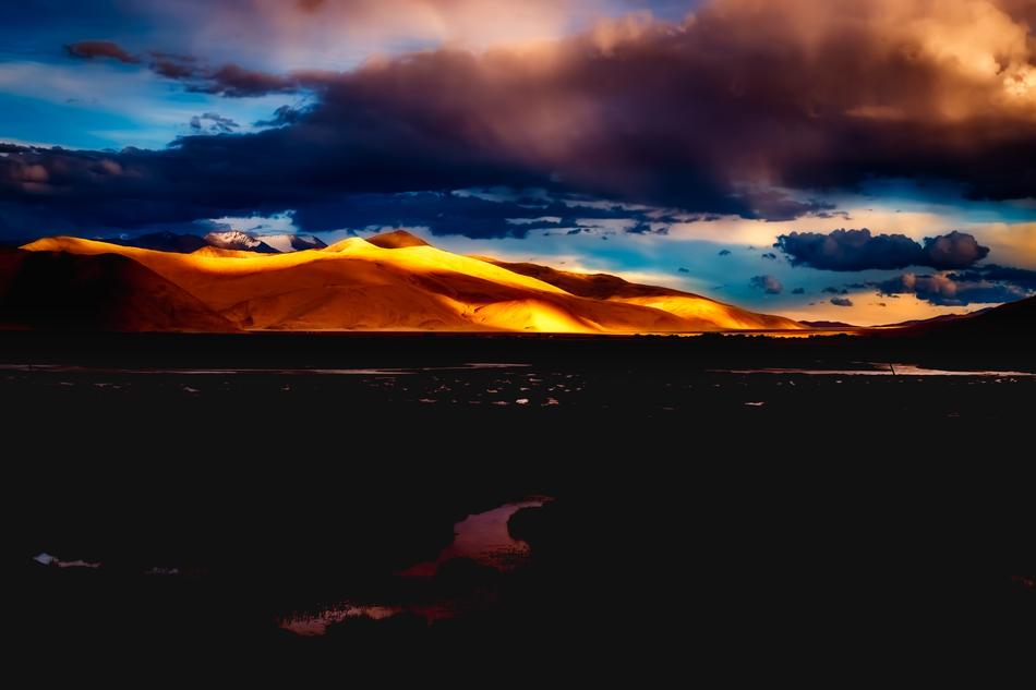 sunset over mountains in india