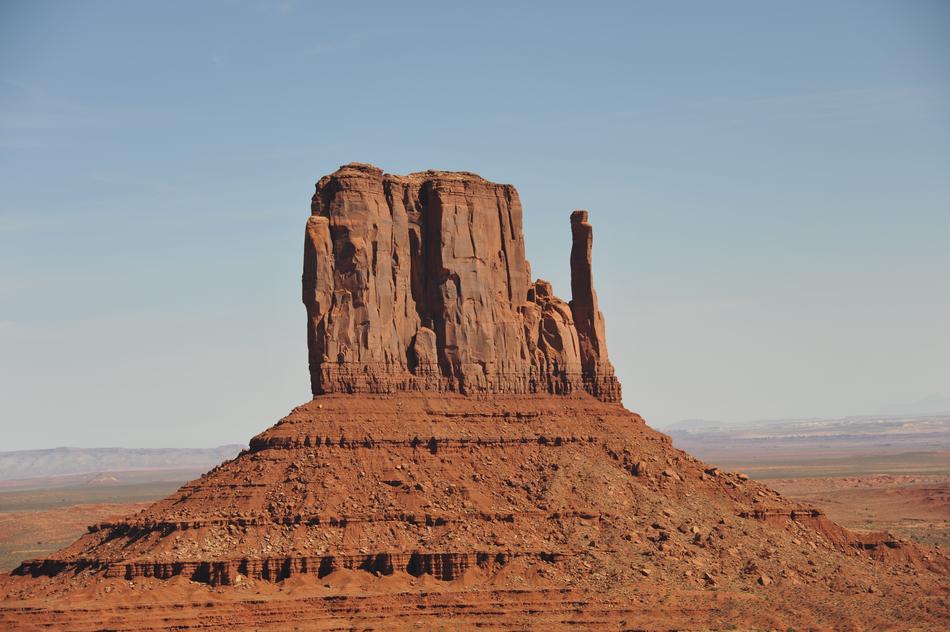 Beautiful landscape with rocks, among the desert, under the blue sky