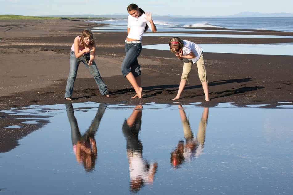 girls on the coast near the ocean