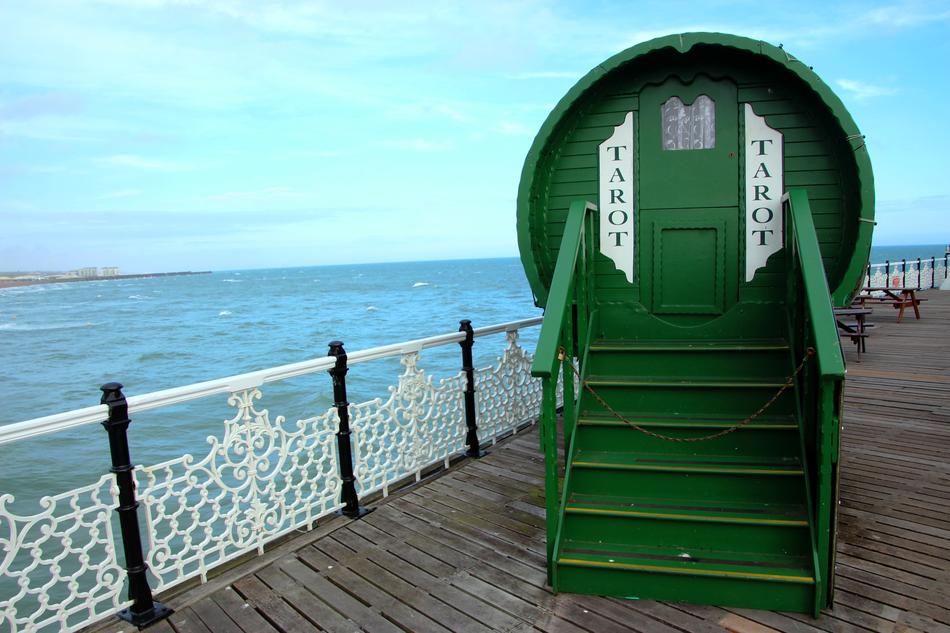 green tarot wagon on the pier