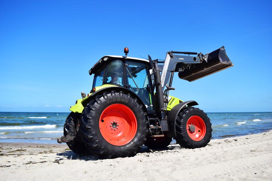 tractor on the Baltic sea beach
