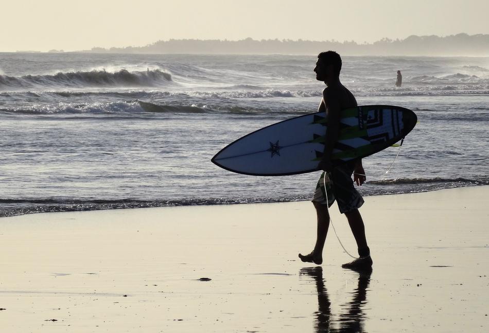 Surfer Bali Beach Against The