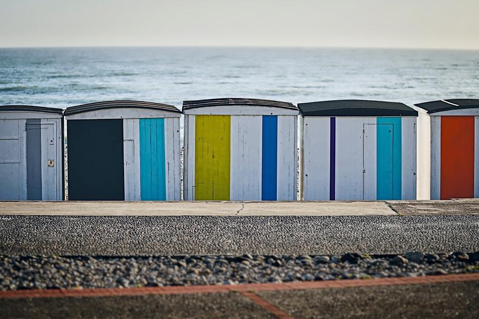 colorful cabanas on the beach in le havre, France